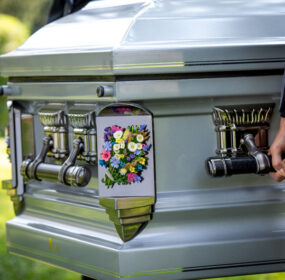 Personalized casket being carried